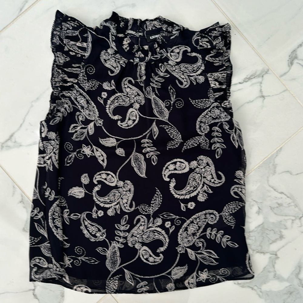 Express tank/blouse. Navy blue/cream paisley with ruffled neck/sleeves. Small
